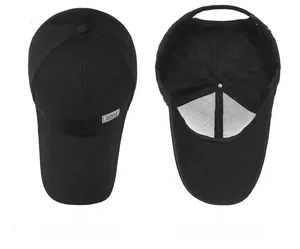 Detail view of black canvas sport baseball cap showing top exterior and inner sweatband