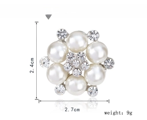 Detail showing elegant flower brooch dimensions 2.4cm by 2.7cm with pearls and crystals