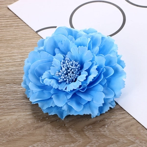 Detailed macro view of the blue fabric peony flower petals and realistic stamen texture