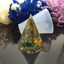 Macro detail of cone-shaped silicone mold with resin craft featuring glitter and flowers