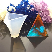 Translucent silicone pyramid mold for resin craft with blue and orange fluid patterns
