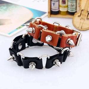 Punk style leather bracelets in black and brown with metal cone studs and buckle