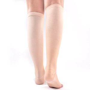 Men's breathable nylon compression socks in beige, mid-calf length for outdoor sports