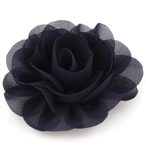 Detailed top view of a multilayered navy blue chiffon fabric flower hair clip accessory