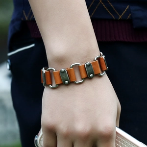 Punk style leather bracelet with silver metal rings and rivets for men and women