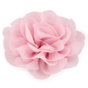 Detailed close-up of a pink chiffon flower hair clip with layered fabric petals
