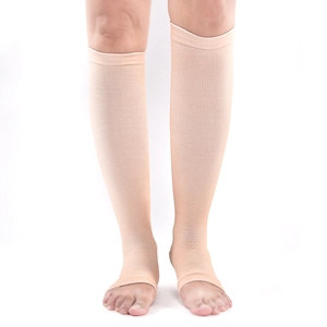 Flesh-colored long compression socks for men with open-toe design and breathable knit fabric