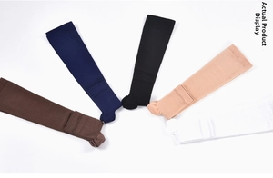 Detail view of five assorted color athletic crew socks featuring ribbed non-slip cuffs
