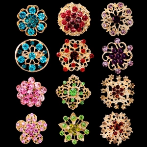Lot de 12 broches dorées avec strass aux motifs variés de fleurs et de flocons de neige