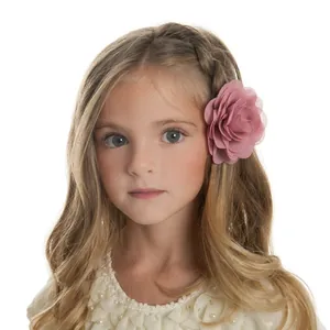 Pink chiffon floral hair clip for girls featuring layered petal design on a white background