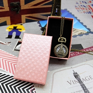 Vintage bronze Eiffel Tower pocket watch necklace with a pink cross-grain jewelry gift box