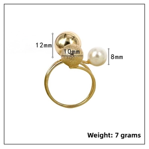 Detail view showing 12mm polished gold ball and 8mm pearl on adjustable multi-layer ring