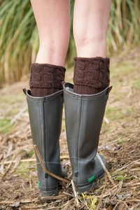 Close-up of dark brown knit leg warmers with textured pattern for rain boots