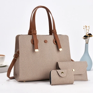 Three-piece women's tote bag set with crossbody strap and matching pouches in brown and white