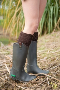 Close-up of cable knit boot cuffs in dark brown shown with outdoor rain boots
