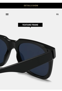 Close-up of texture frame and deep blue lenses on stylish square sunglasses