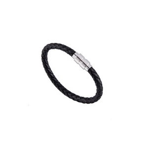 Detail of black braided leather bracelet featuring a silver magnetic clasp closure