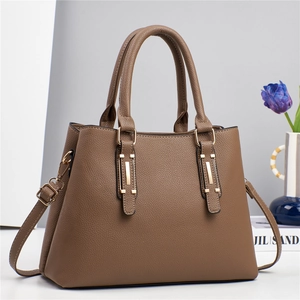 Elegant brown litchi pattern leather handbag with gold metal hardware and shoulder strap