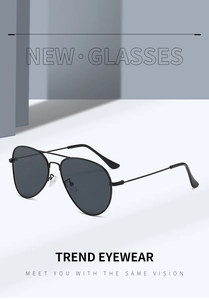 Macro shot of stylish black aviator sunglasses with classic double bridge and metal frame