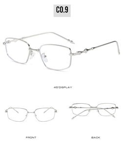 Detailed view of silver rectangular metal sunglasses with embossed geometric temple design