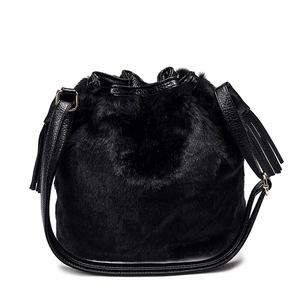 Faux fur leopard print bucket bag for women with black tassels and leather strap