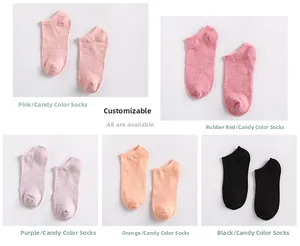 Detail view of five low-cut invisible cotton socks in pink, purple, and orange tones
