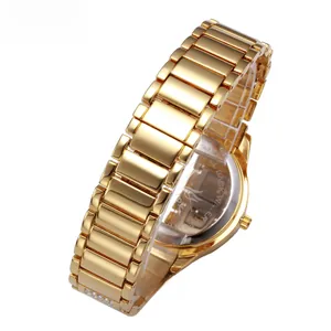 Detailed macro view of gold stainless steel watch band with waterproof engraving