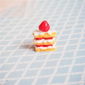 Macro shot of 25mm miniature strawberry napoleon cake resin food model for DIY crafts