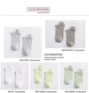 Detail view of cotton low cut socks in blue, gray, white, and green pastel colors