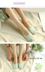 Detail of mint green invisible boat socks with thin breathable mesh and elastic edge