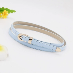 Close-up of a light blue skinny PU leather belt with gold metal buckle and end clip
