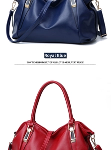 Detailed macro view of royal blue and red pebble leather texture on large tote bags