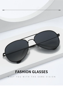 Macro detail of black metal aviator sunglasses with classic double bridge on a white stand