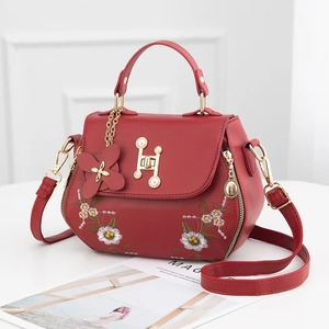 Fashionable red PU leather handbag with daisy embroidery and elegant pearl H-lock