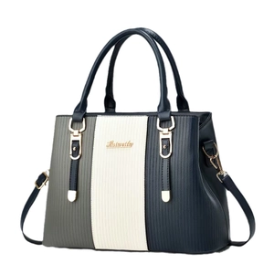 Three-tone crossbody handbag with blue white grey stripes and gold hardware accents