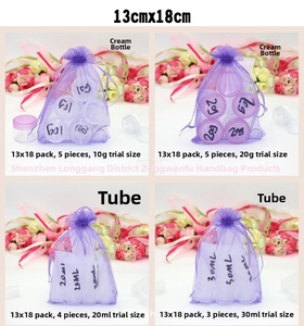 Purple organza drawstring gift bag 13x18cm showing capacity for small cosmetic jars