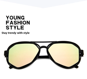 Close-up of polygon fashion sunglasses featuring a black frame and peach yellow gradient lens