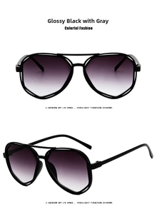 Detailed views of polygon pilot sunglasses with bright black frames and purple gradient lenses