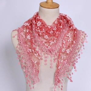 Close-up of pink lace triangle headscarf with floral embroidery and hanging petal tassels