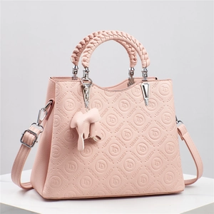 Bolso rosa con relieve LDLDLD, asa trenzada y colgante de elefante para mujer elegante