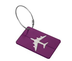 Detail of purple metal luggage tag with airplane cutout and secure steel wire cable