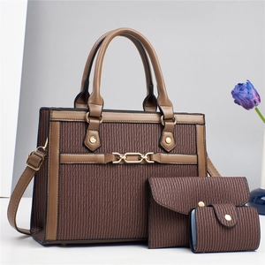 Three-piece brown embossed PU leather handbag set with gold chain and rivet details