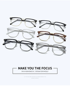 Detailed view of semi-rimless eyeglass frames with metal accents and adjustable nose pads