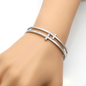 Double-layer stainless steel cross bracelet with sparkling pavé zircon stones