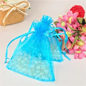 Light blue organza drawstring gift bag with pearl beads for jewelry packaging