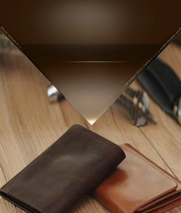 Close-up of premium PU leather men's bifold wallets in dark brown and tan colors