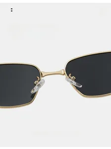 Detail view of comfortable silicone nose pads on gold metal frame square sunglasses