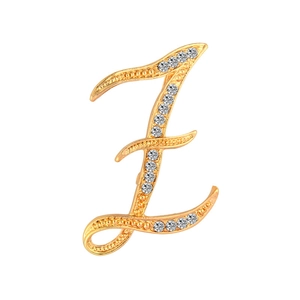 Detailed view of a gold-plated letter Z brooch with sparkling crystal rhinestones