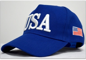 Detail showing high-quality white USA embroidery and American flag on a navy baseball cap