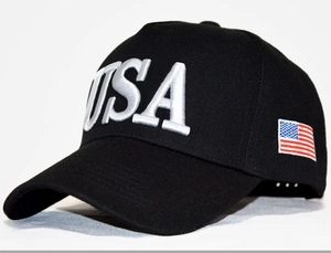 Detailed side view of black baseball cap with white USA embroidery and flag patch